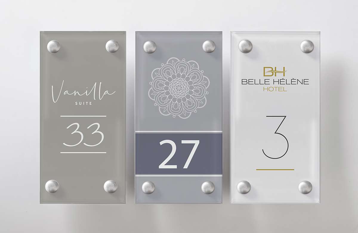 Frosted acrylic hotel room number signage with standoff fixings